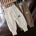 M Beige