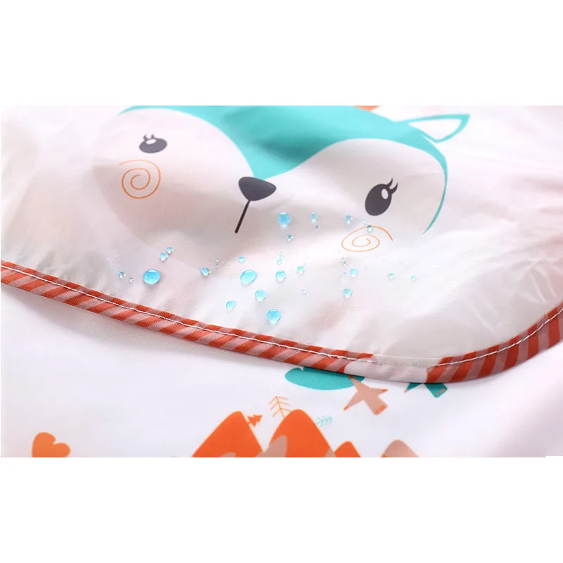 Babero impermeable con bolsillo recogecomidas para bebé - imagen 3