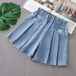 Shorts vaqueros infantiles con estampado divertido para niño