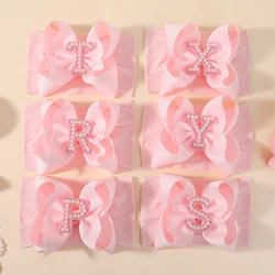 Diadema de perlas con lazo rosa grande para niña – banda nailon suave