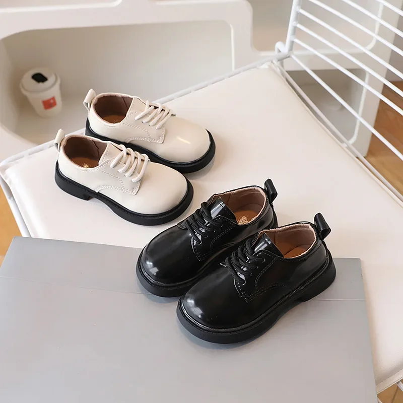 Zapatos de cuero de estilo británico para niños y niñas, zapatos con cordones de punta redonda, mocasines escolares de moda, color blanco y negro - imagen 2