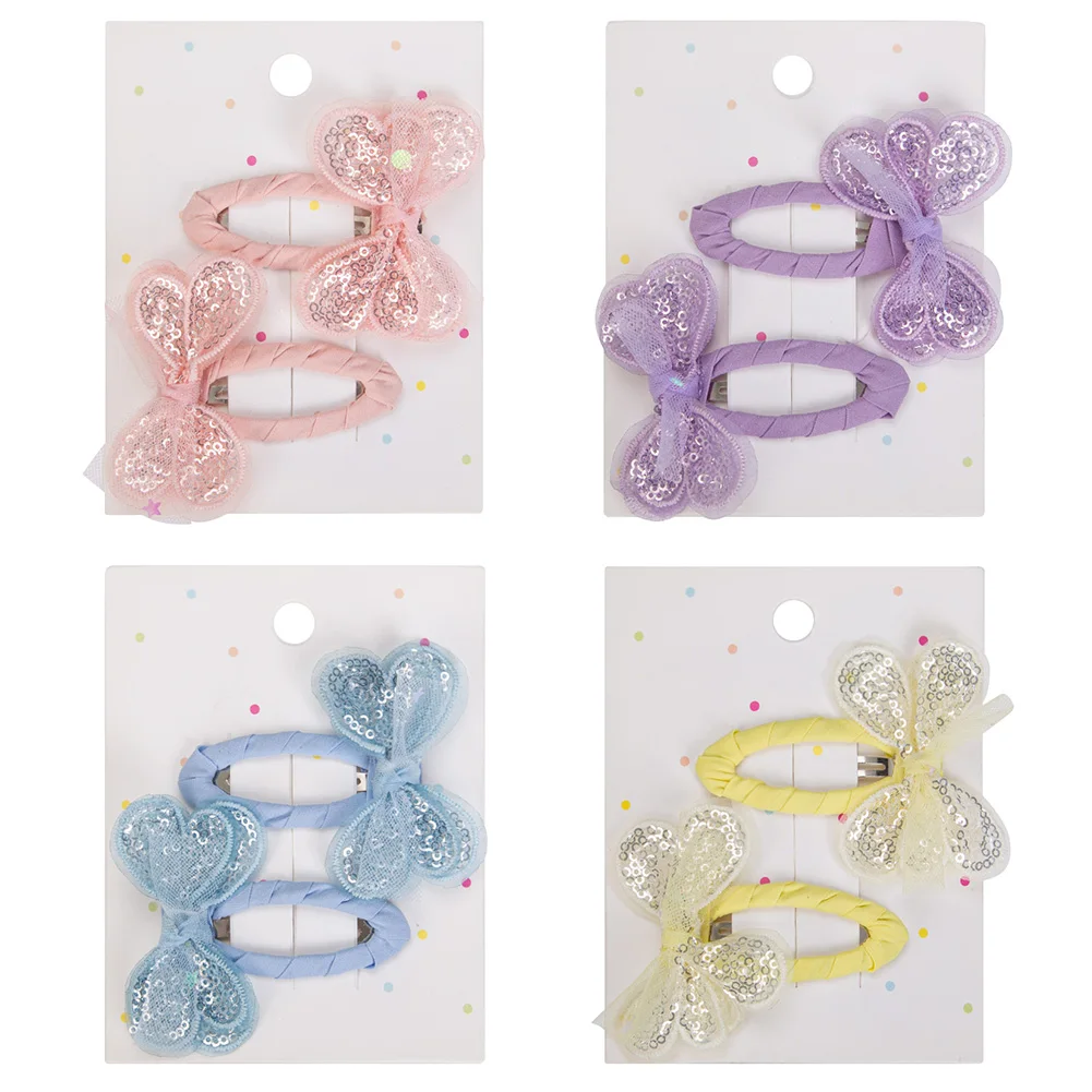 Pinzas de pelo con mariposa y lentejuelas para niña - imagen 2