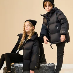 Chaqueta de plumón infantil dorada y negra – Cálida y ligera
