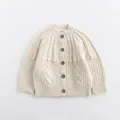 beige sweater