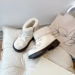 Botas de lana para niña con lazo – cálidas y cómodas