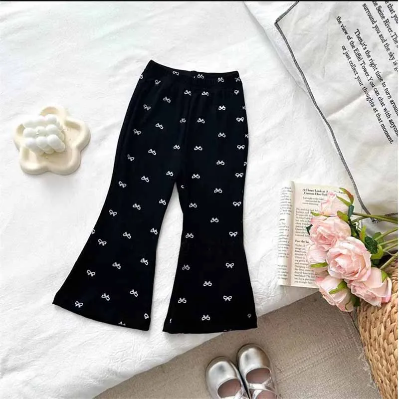 Pantalones verano informales para niños con lazo y estilo acampanado
