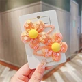 orange sequin flower