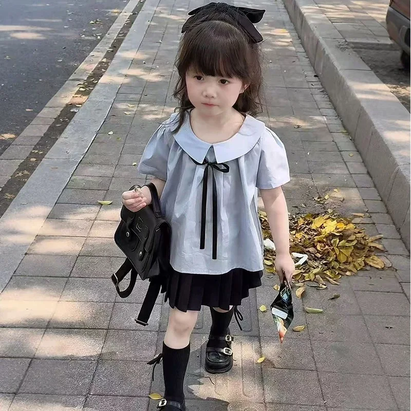 2025 Conjunto de falda plisada de Color sólido de estilo universitario para niñas de primavera y verano, camisa de manga corta de verano, conjunto de dos piezas con estilo - imagen 4