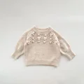 light pink sweater