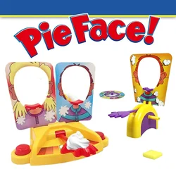 Juego de mesa pastel en la cara para fiestas familiares