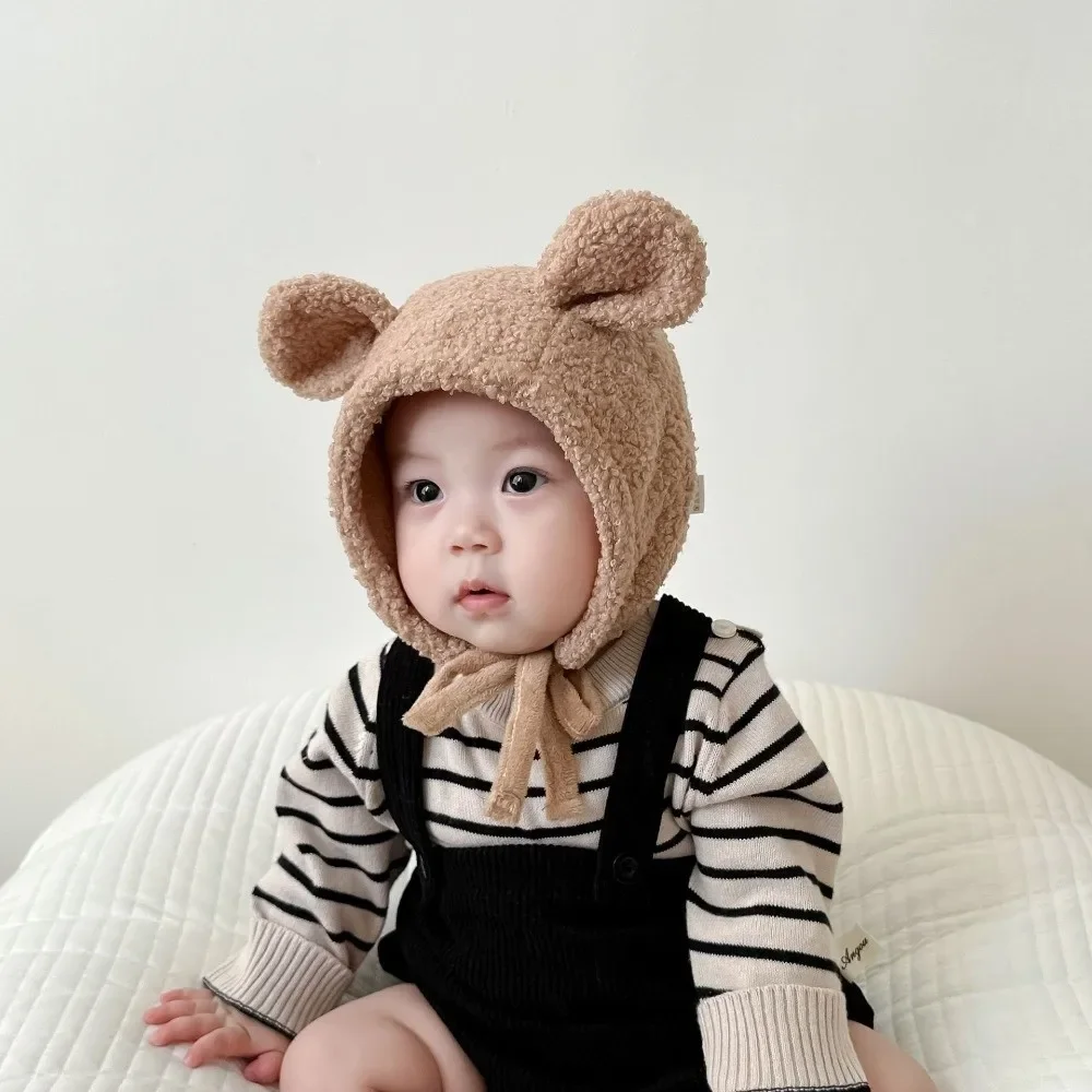 Gorro infantil térmico con orejetas de lana de cordero para invierno
