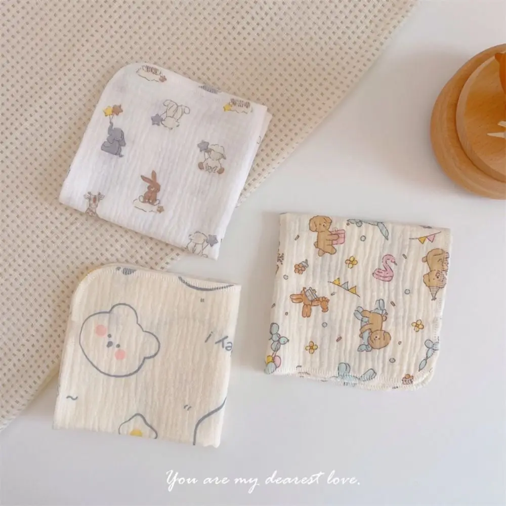 Toalla con babero para bebé de algodón – Estampado floral