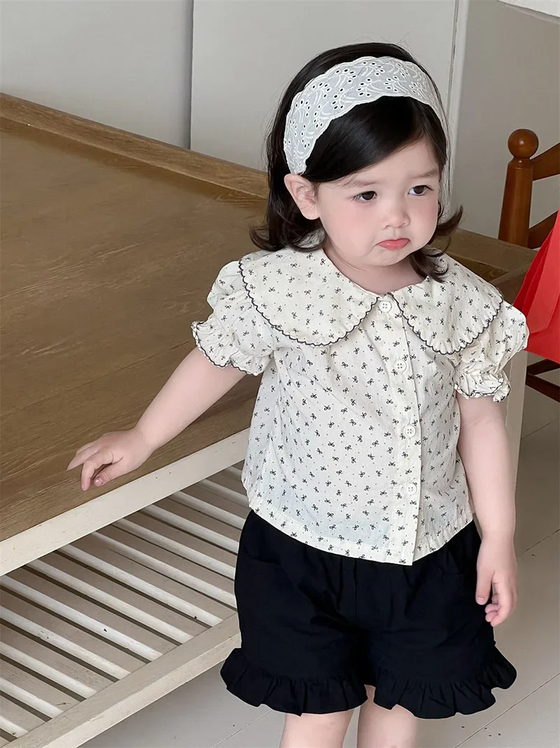 MILANCEL, nueva camisa con lazo de verano para niñas, 9M-3T, blusa fina bonita con cuello de muñeca para bebés, pantalones cortos holgados versión coreana para niños pequeños