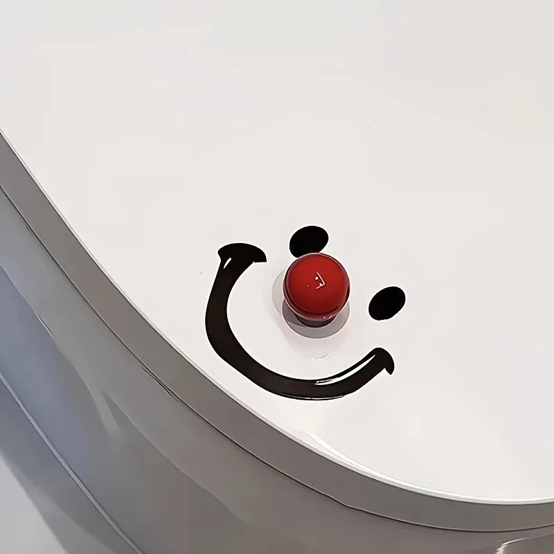 Elevador de tapa inodoro con bola sonriente para bebé