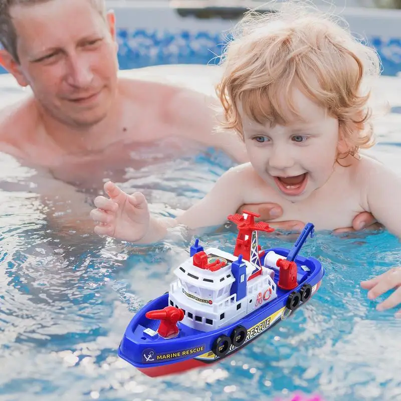 Barco eléctrico de bomberos para bañera con luces y pulverizador - imagen 2