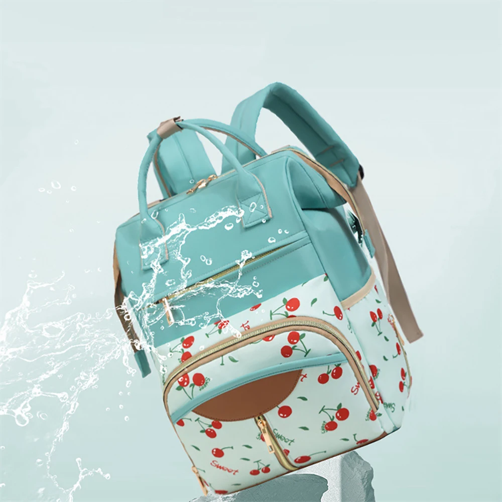 Bolsa portabebés azul multicapa – Práctica y antirrobo - imagen 2