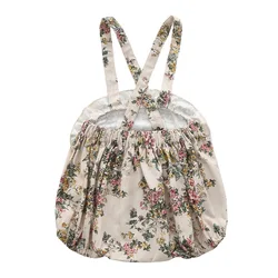 Mono de niña vintage floral con tirantes – estilo retro