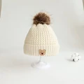 beige hat