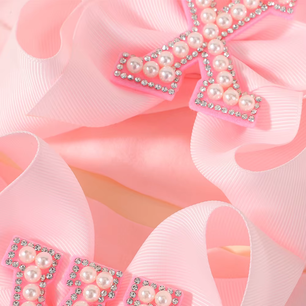 Diadema de perlas con lazo rosa grande para niña – banda nailon suave - imagen 4