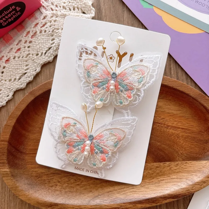 Pinza mariposa bordada con perla – Elegante accesorio pelo niña - imagen 5
