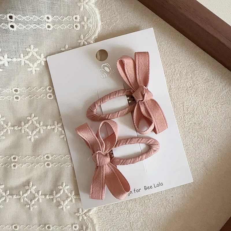 Clips de pelo bebés princesa hoja lateral beige rosa lazo algodón