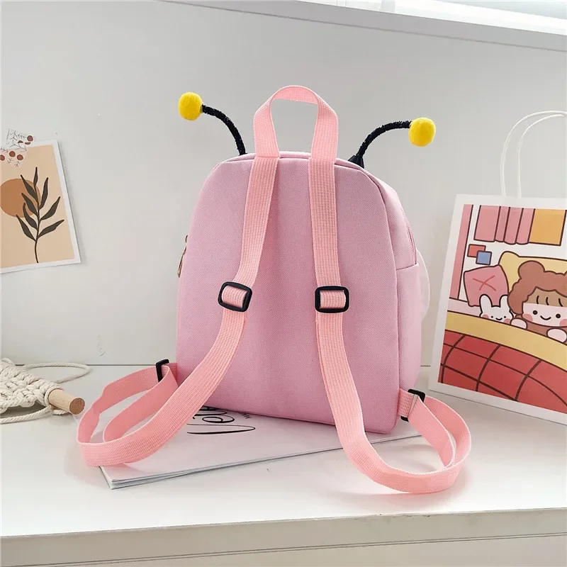 Mochila escolar de dibujos animados para niños, bolsa antipérdida para bebés, color amarillo y rosa, bolso de hombro para niños y niñas - imagen 3