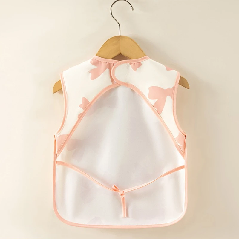 Baberos sin mangas para alimentación de bebé, paños para eructar con lazo de estrella, impermeables, a prueba de polvo, accesorios para niños - imagen 2