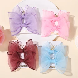Horquillas con lazo de gasa rosa para niñas