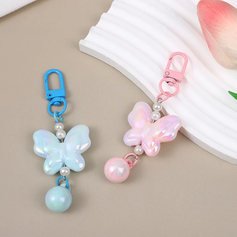 LLavero con colgante de perlas y lazo a la moda, encantador llavero para estudiantes y niñas, bolso para mujer, mochila, bolso colgante, funda para auriculares, joyería - imagen 3