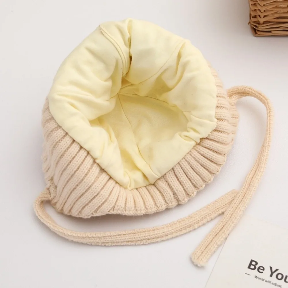 Gorro cálido de lana con protección para los oídos para bebé, Material grueso, estilo oreja de oso, gorro infantil, diseño de punto, cierre de corbata, gorro para niño pequeño - imagen 3