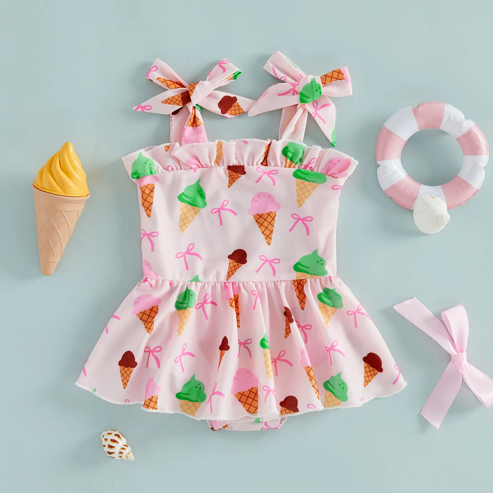 Bañador tipo peto sin mangas para niña con estampado floral y lazos - imagen 3