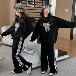 Conjunto de jersey y pantalón para niño con pajarita elegante
