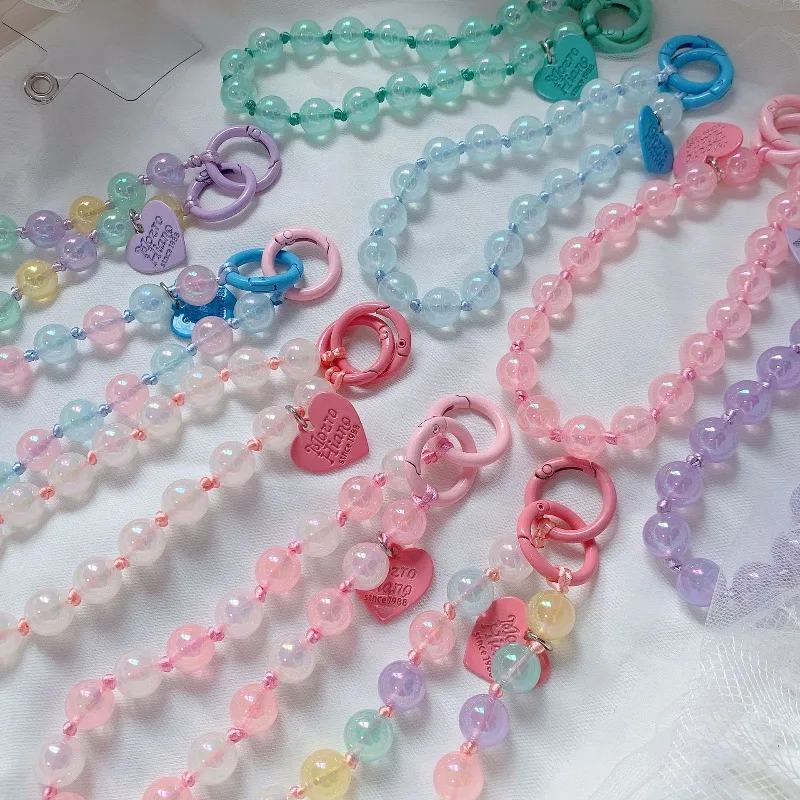 Sujetachupete cordón transparente con correa muñeca y corazón - imagen 2