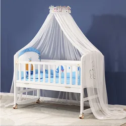 Cuna de madera blanca con mosquitera y colchón basculante para bebé