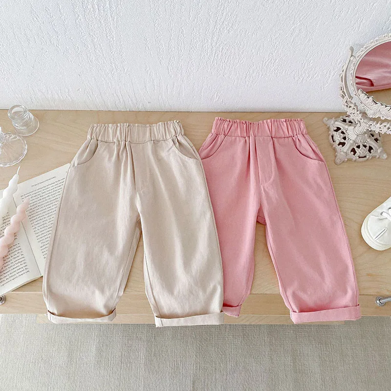 Pantalones casuales de otoño para niños, pantalones de cintura liso elástico para niñas, pantalones sueltos suaves de color rosa dulce