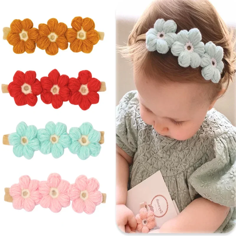 Diadema bebé lana con flores tejida artesanal