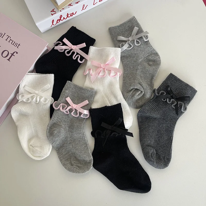 1 par de calcetines coreanos sencillos y bonitos para bebé, calcetines hasta la pantorrilla con lazo y volantes de Color sólido para niña, calcetines de algodón suave para primavera y otoño - imagen 2