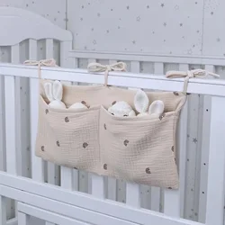 Bolsa organizadora de pañales para cuna de bebé