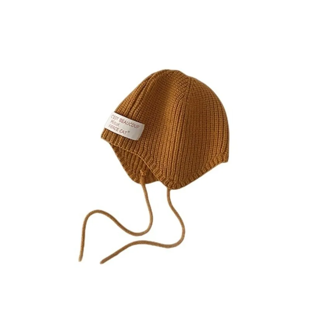 Conjunto bebé jersey de punto y gorro con protección auditiva - imagen 4