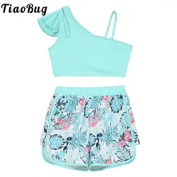 Bañador niña camiseta asimétrica pantalón corto estampado tropical