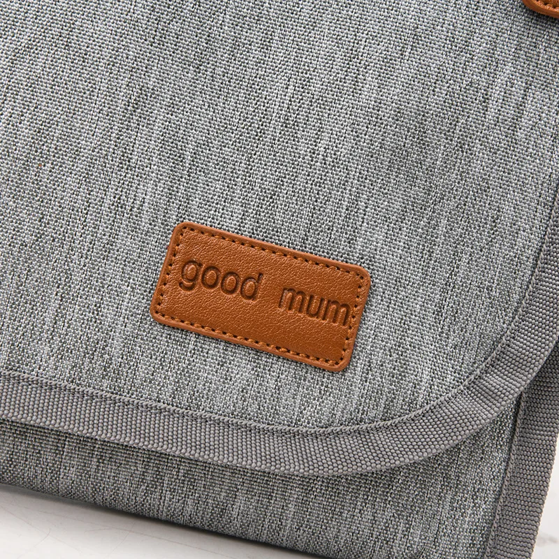 Almohadilla de pañales para bebé 3 en 1, impermeable, cambiador de pañales, viaje, multifunción, portátil, cubierta de pañal para bebé, estera, bolsa de pañales plegable a mano - imagen 5