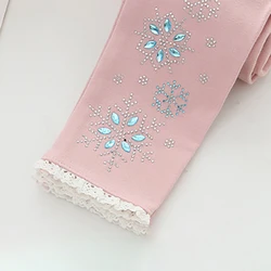 Pantalones de invierno para niña con estampado de copos de nieve