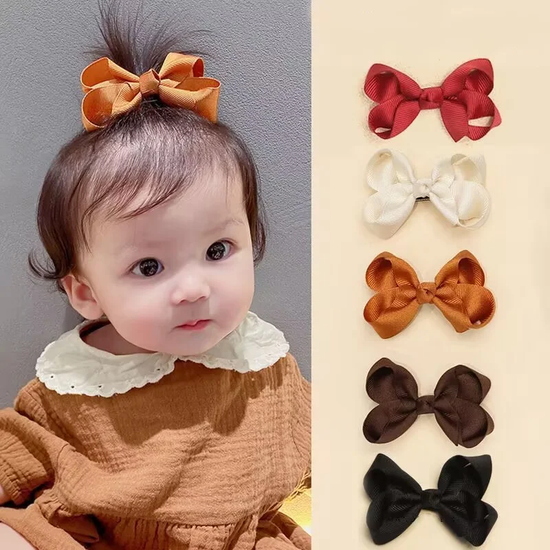 Pinzas para el pelo bebé con lazos estilo caramelo y New Kid - imagen 2