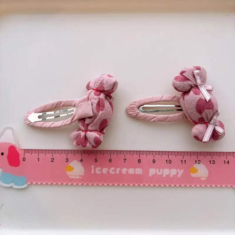 Pinza de pelo con lazo rosa y corazones para niña - imagen 3