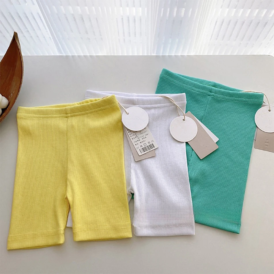 Ropa interior para niños y niñas, pantalones coreanos de Color caramelo, pantalones cortos cómodos de seguridad, cintura elástica, 2-8T, Verano