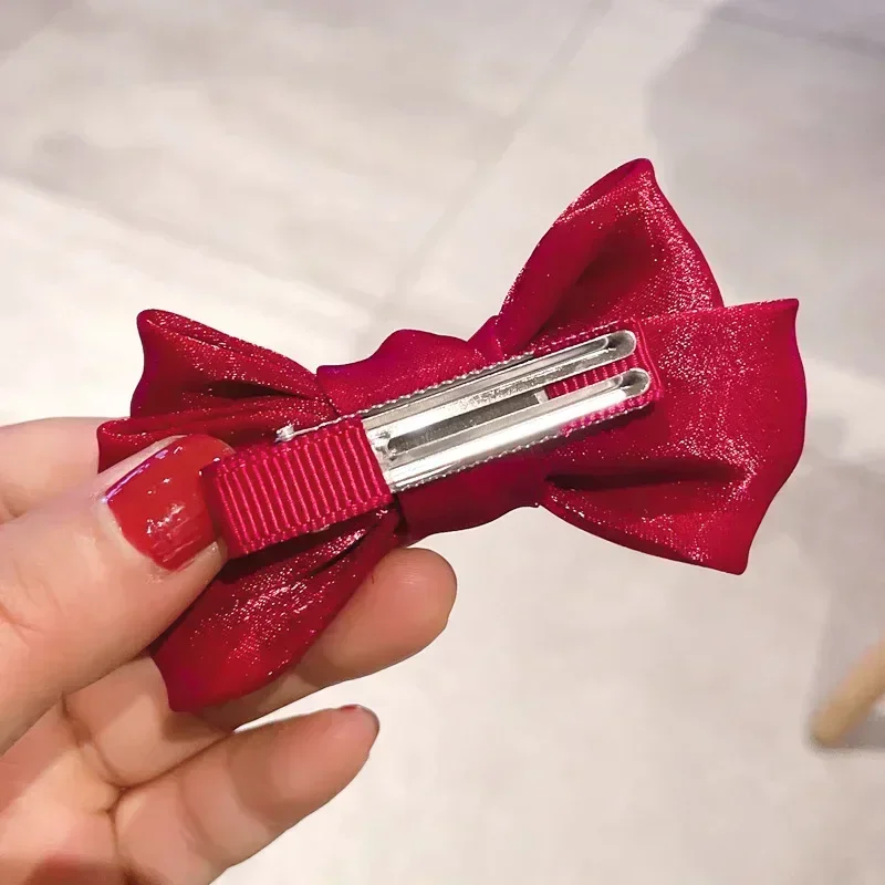 Pinzas de lazo grande en satén para niña – Accesorios pelo - imagen 4