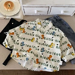 Camisa infantil de dinosaurios con cuello vuelto