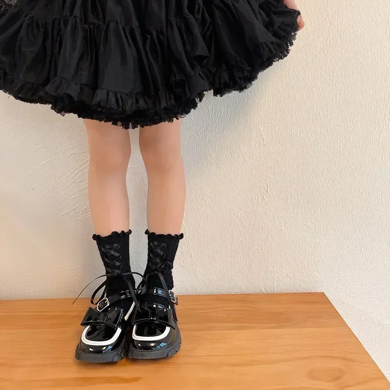 Calcetines de encaje con lazo y volantes para niña