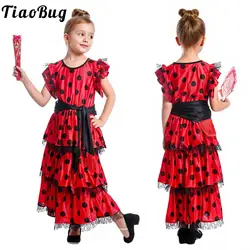 Vestido flamenco de niña con encaje, lunares y volantes con cinturón