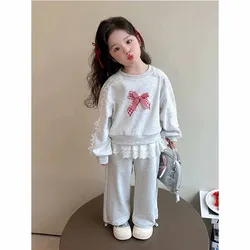 Conjunto primavera niña con lazo – Jersey y pantalón de algodón